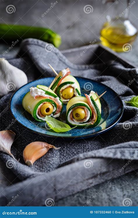 Rolled Zucchini Slices Stuffed With Bacon Cream Cheese And Olive Stock