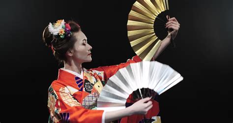 4k Beautiful Japanese Geisha Dancing On Stage And Posing For The Camera