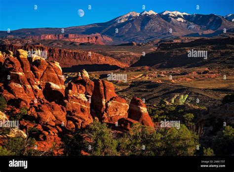 Moonrise Over The La Sal Mountains And Red Rocks Of Arches National