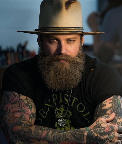Most of the viking beard styles are unkempt & cluttered, but this one is to its extreme level. men beard #Ties | Beard styles for men, Viking beard styles, Curly beard