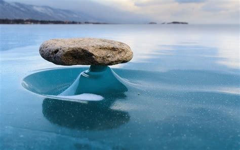 Rocks On The Lake Baikal Get Heated From The Sunlight Every Now And