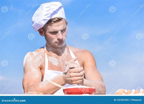 Baker Concept Man On Busy Face Wears Cooking Hat And Apron Sky On Background Cook Or Chef