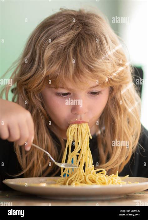Child Portrait Eat Spaghetti Hungry Hi Res Stock Photography And Images