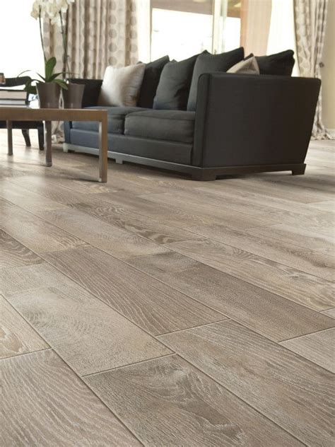 Lighter colored flooring makes smaller rooms feel more spacious, while darker flooring makes larger peel and stick vinyl flooring tiles are removable and quick and easy to install, making add the warm, comfortable style of real wood to interior living spaces. Modern Living Room Floor Tile that looks like wood .... a ...