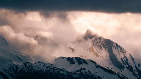 Download Wallpaper 1920x1080 Mountain Peak Clouds Snow Light