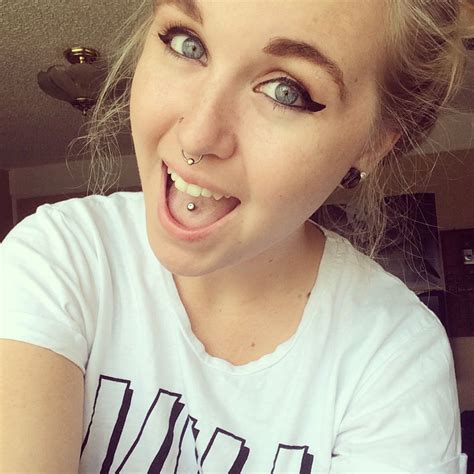 Tongue Ring Nostril And Septum Piercing