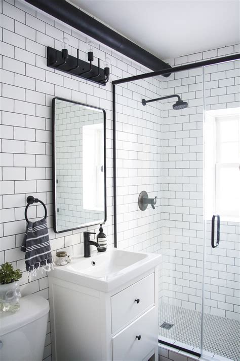 Swiss madison voltaire 60 in. A Modern Meets Traditional Black and White Bathroom Makeover - Kristina Lynne