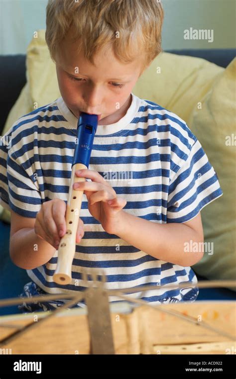 Little Boy Playing Recorder Stock Photo Alamy