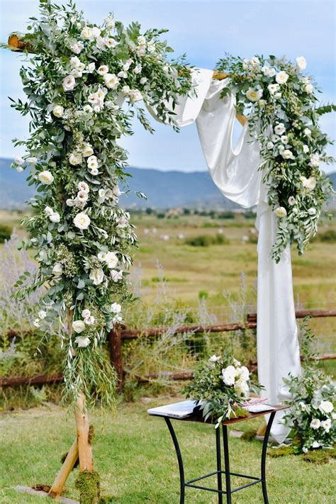 Free Photo Decorated Wedding Arch With Greenery And White Eustomas In