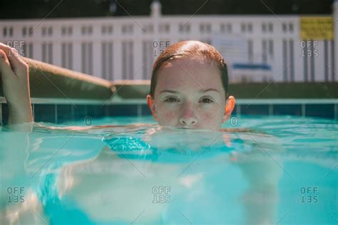 Girl With Face Partially Underwater In Pool Stock Photo OFFSET