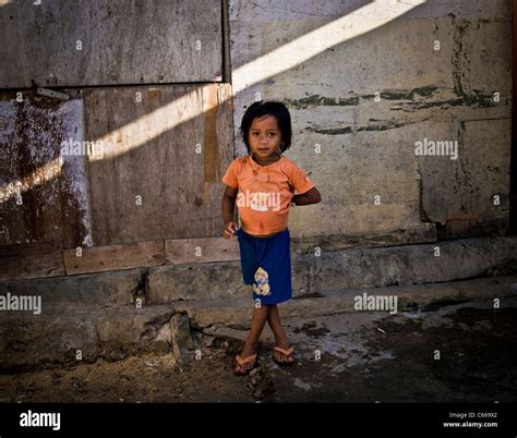 Balinese Girl In Slums Stock Photo Alamy