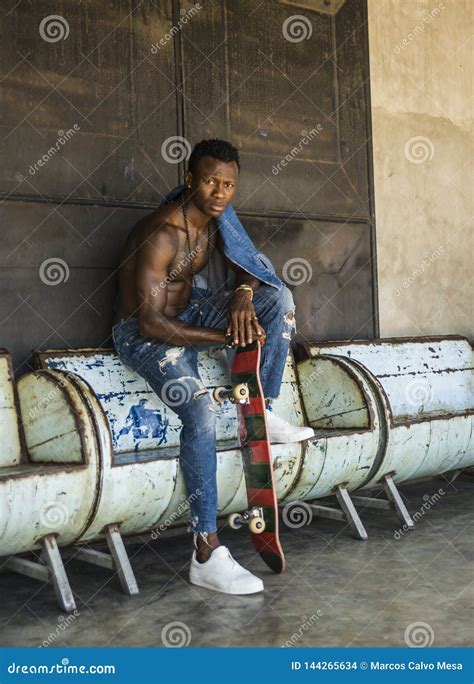 Young Handsome And Attractive Black African American Skateboarder Man