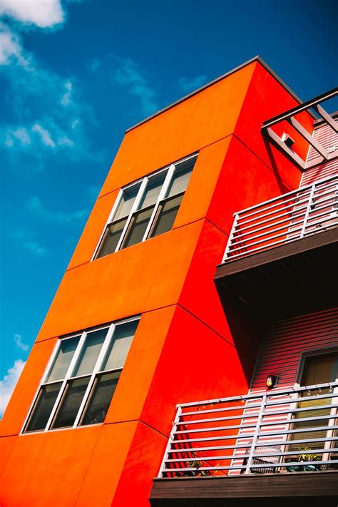 Online Crop Hd Wallpaper Low Angle Photography Of Orange Concrete