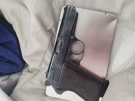 Pistol On Bed