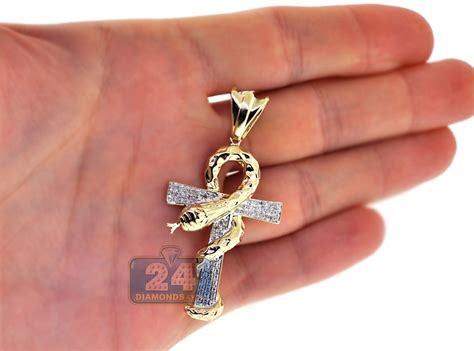 A heart shaped pendant at myntra can be the perfect gift for your lady love. Mens Diamond Snake Ankh Cross Pendant 10K Yellow Gold 0.31ct