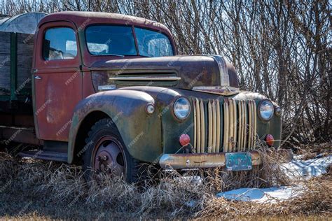 Premium Photo Abandoned Vintage Green And Red Two Ton Truck On The