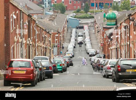 A Muslim Street In Blackburn Lancashire Uk With Mosque Stock Photo