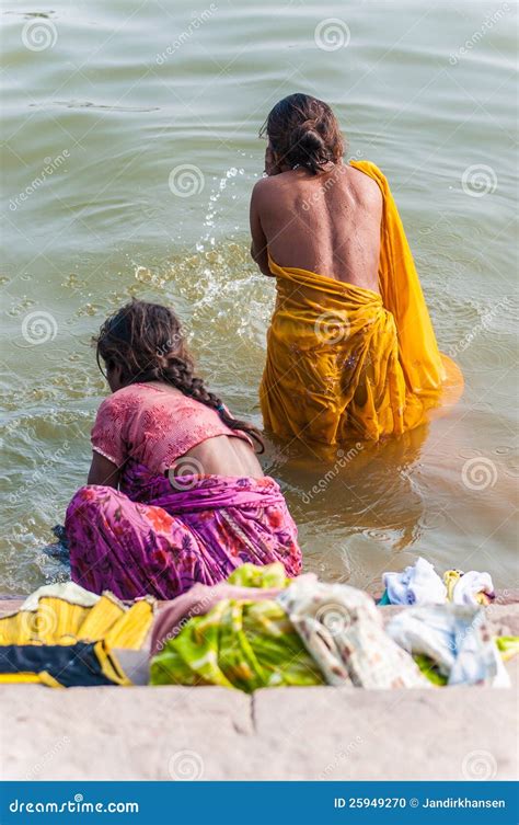 Two Women Take A Bath In The River Ganges Editorial Image Image 25949270