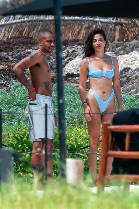 Shanina Shaik Slips Into A Blue Bikini As She Cools Off In The Ocean During Her Vacation In