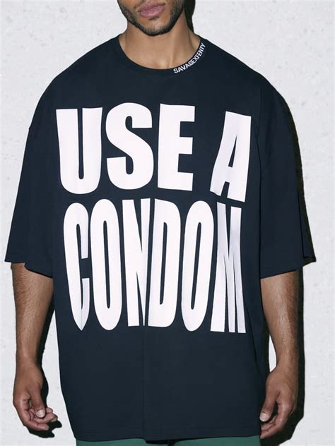 use a condom oversized graphic tee in black and multi savage x fenty