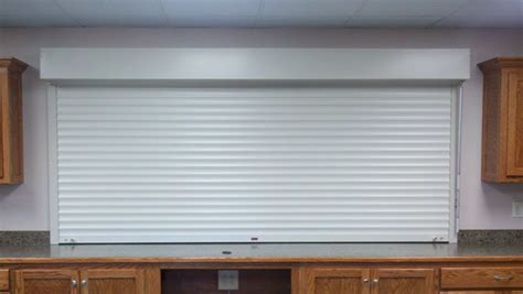 One idea for kitchen windows is the interior shutter. Counters & Serving Windows - Wheatbelt, Inc.