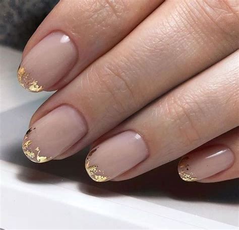 Picture Of A French Manicure Done With Gold Foil On The Edge Is A Fresh