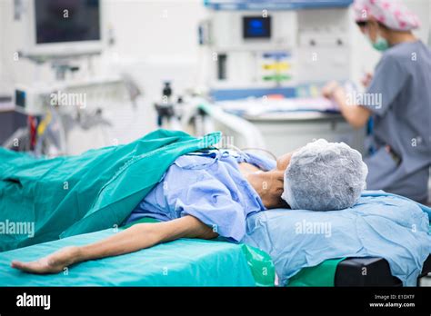 Patient Lay Down On The Bed Ready For Surgery Stock Photo Alamy
