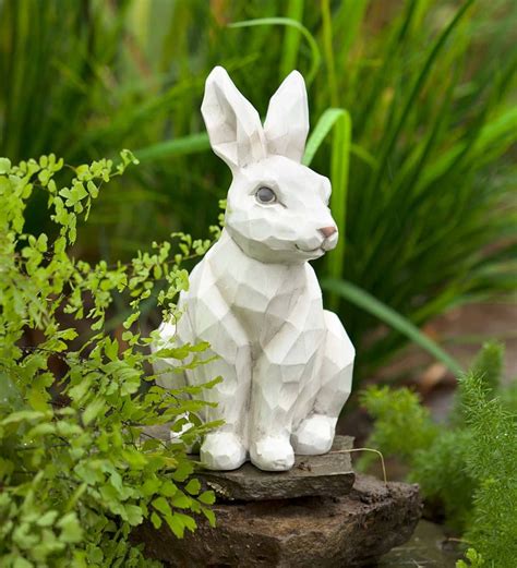 Admire A Woodcut Rabbit Statue In Your Garden Without Worrying About