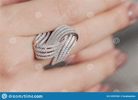 Close Up Of Boho Styled Woman Hands With Silver Jewelry Stock Image