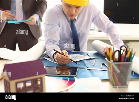 Male Architector Working On Construction Project Stock Photo Alamy