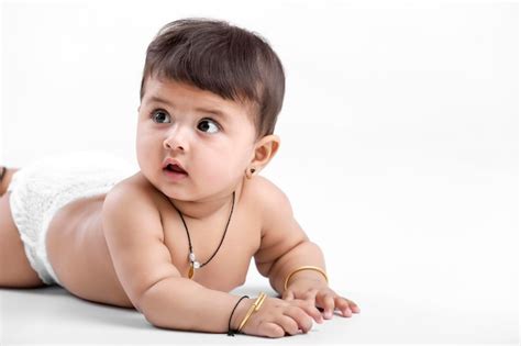 Premium Photo Indian Baby Girl Playing On White Background