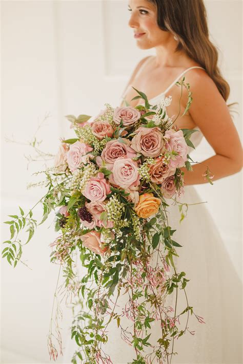 Lush Cascading Wedding Bouquet In Mauve Tones With Greenery Floral