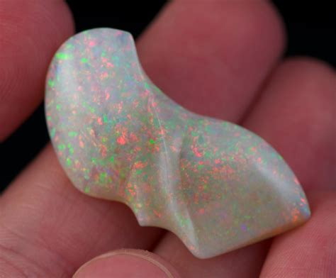 A White Opalite In Someones Hand