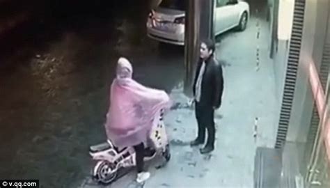 video footage shows woman being sexually assaulted on the street in china daily mail online