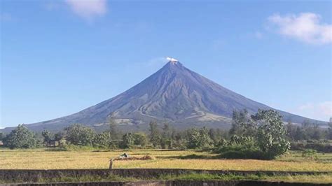 Early Morning Stroll With Fascinating View Of Calm Mayon Volcano