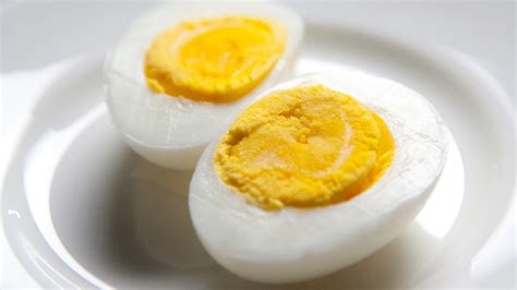 When possible, store the hard boiled eggs at the back inside their original egg carton. Video: How to Peel a Hard-Boiled Egg | Martha Stewart