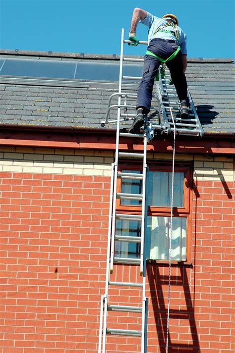 Rooftop Safety Harness Photograph By Crown Copyrighthealth And Safety