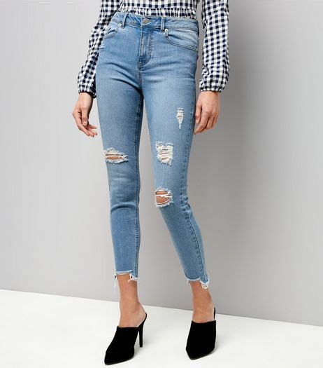 blue ripped fray hem skinny jenna jeans new look new look fashion fashion denim trends