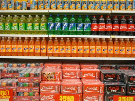 1366x768 wallpaper | soda products arranged on retail gondola | Peakpx