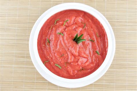 Top View Of Tasty And Healthy Tomato Soup With Tomatoes Stock Photo