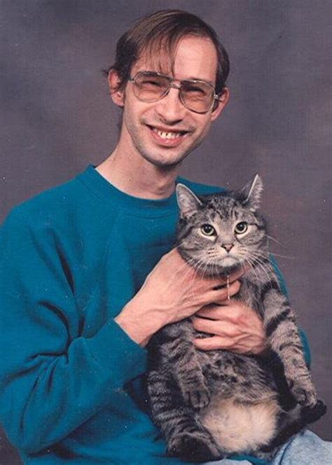 the absolute worst pictures of men holding cats men with cats