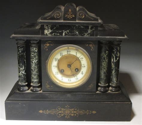A Victorian Black Marble Mantel Clock With 4 Column Front 34cm Wide