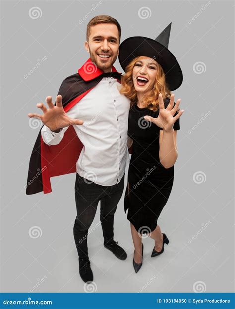 Couple In Halloween Costumes Of Witch And Vampire Stock Photo Image