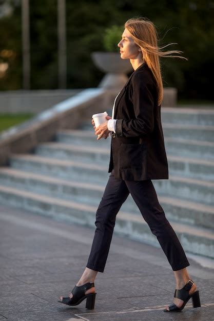 Free Photo Side View Young Woman Walking Away