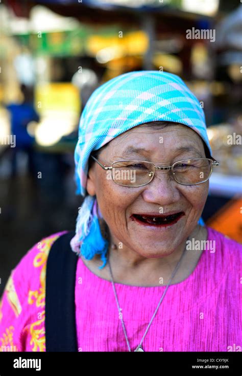 The Betel Nut Effect An Old Burmese Woman With Red Teeth Stock Photo Alamy