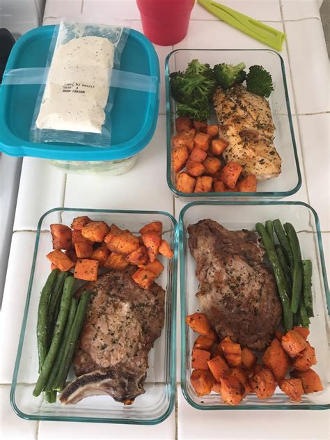 While the potatoes cook, wash and pat dry the broccoli crowns. Meal prep for my SO and I! Pork chops sweet potatoe and ...