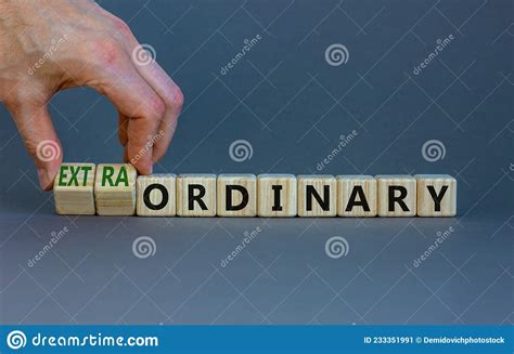 Ordinary Or Extraordinary Symbol Businessman Turnes Wooden Cubes And
