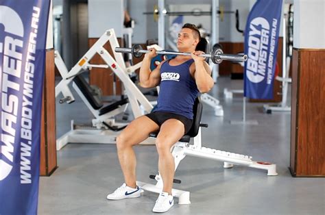 Seated Barbell Military Press — How To Do It Video Of Performing