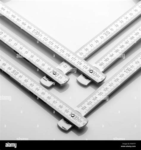 Closeup Of White Wooden Rulers Stock Photo Alamy
