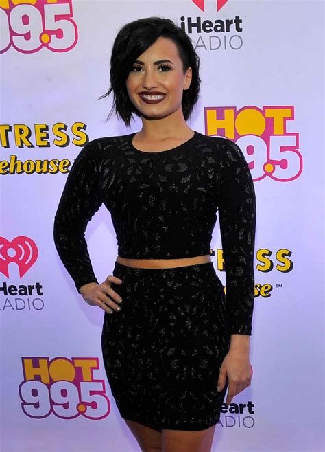 Selena seems more effortless and reserved imho edited to add: Demi Lovato - HOT 99.5s Jingle Ball 2015 in Washington, D ...